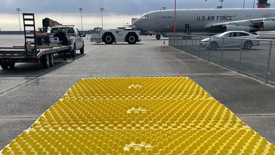 A rumble strip laid in a transition area to avoid entering FOD into aircraft operating regions with an airport.